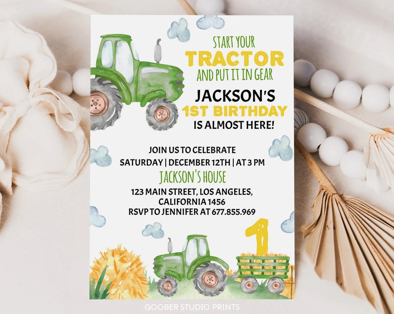 May include: Green tractor birthday invitation with watercolor clouds and a yellow number one. The text reads "Start your tractor and put it in gear Jackson's 1st Birthday is almost here!" Join us to celebrate Saturday | December 12th | at 3 PM Jackson's House 123 Main Street, Los Angeles, California 1456 RSVP to Jennifer at 677.855.969 Goober Studio Prints"