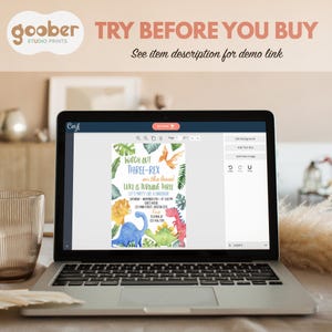 May include: A laptop displays a dinosaur-themed birthday party invitation. The invitation features colorful dinosaur illustrations, tropical leaves, and the text "WATCH OUT THREE-REX" and "LUKE IS TURNING THREE". The laptop screen also shows editing tools.