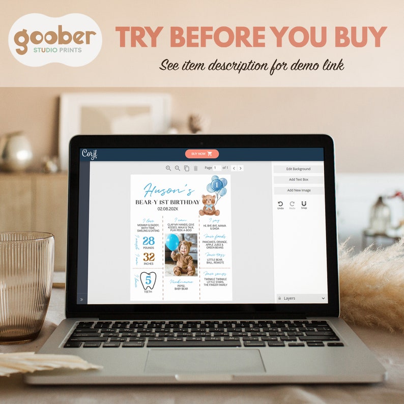 May include: A laptop screen displaying a digital template for a first birthday milestone poster. The design features a brown teddy bear, blue balloons, and text including Huson's Bear-y 1st Birthday, 28 pounds, 32 inches, and 5 teeth.