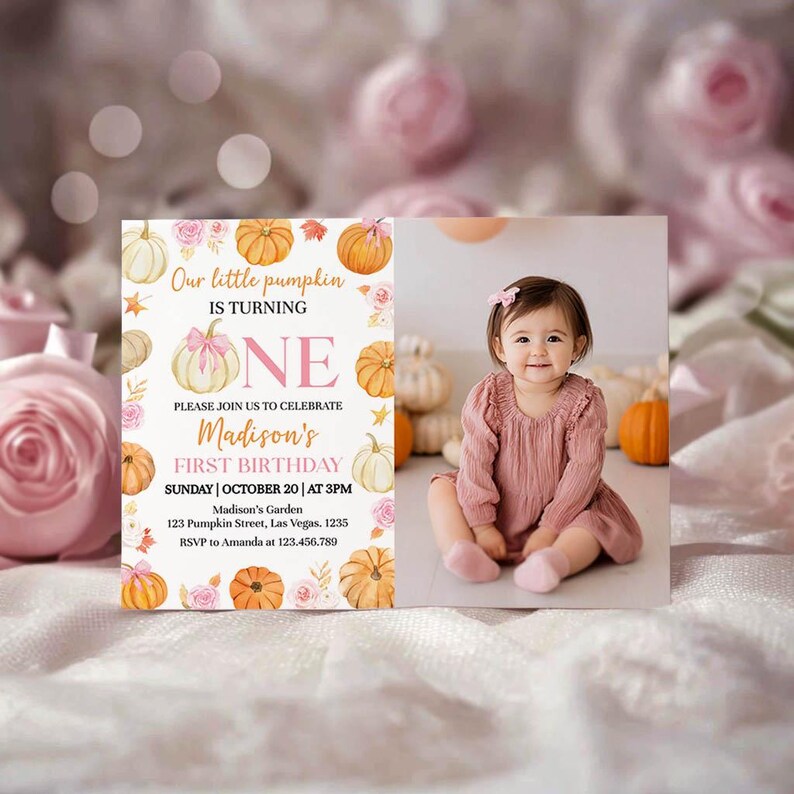 May include: A first birthday invitation with a watercolor pumpkin theme. The invitation features the text "Our little pumpkin is turning ONE" and includes the event details. A photo of a baby girl in a pink dress is on the right.