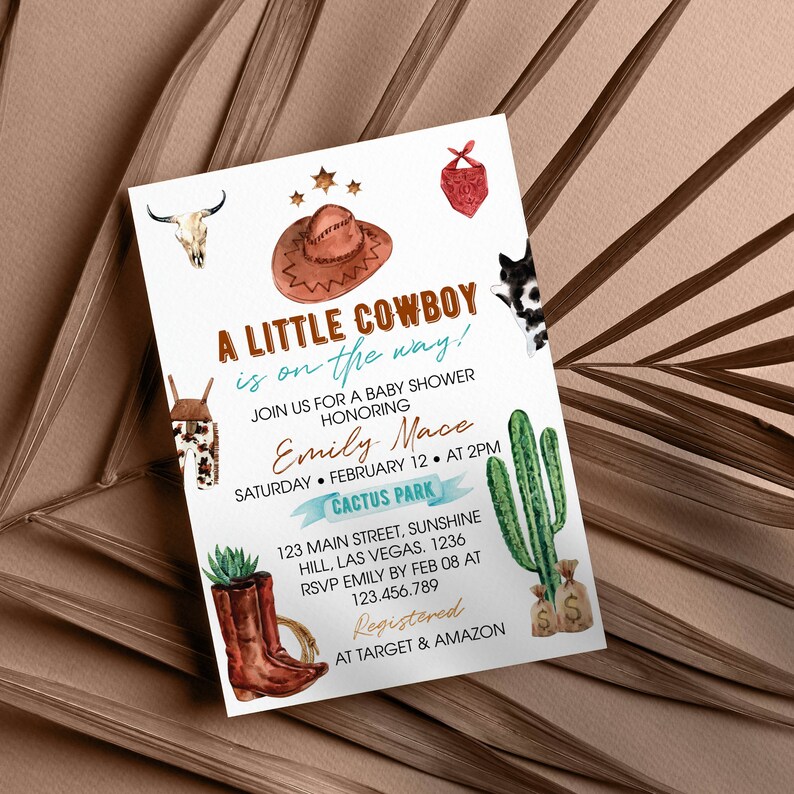 May include: A white baby shower invitation card featuring watercolor illustrations of a brown cowboy hat, a cow skull, a red bandana, a cactus, and brown leather boots. The text reads A LITTLE COWBOY is on the way! JOIN US FOR A BABY SHOWER HONORING Emily Mace SATURDAY FEBRUARY 12 AT 2PM CACTUS PARK 123 MAIN STREET SUNSHINE HILL LAS VEGAS 1236 RSVP EMILY BY FEB 08 AT 123.456.789 Registered AT TARGET & AMAZON.