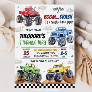 May include: A colorful invitation for a monster truck themed birthday party. The invitation features a watercolor illustration of four monster trucks, with the text "BOOM...CRASH IT'S A MONSTER TRUCK BASH!" and "Let's Celebrate Theodore's is Turning Three". The invitation also includes details about the party, such as the date, time, and location.