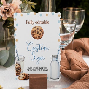 May include: A printable sign with a blue and brown watercolor design featuring a chocolate chip cookie, a glass of milk, and a milk bottle. The sign says "Fully editable Custom Sign" and "Type your own text. Create multiple signs."