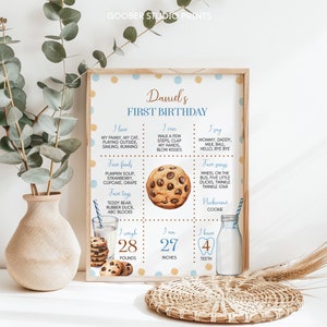 May include: A blue and yellow illustrated printable first birthday chart for a boy named Daniel. The chart includes details about his favorite foods, toys, songs, and what he can do. It also includes his weight, height, and number of teeth.