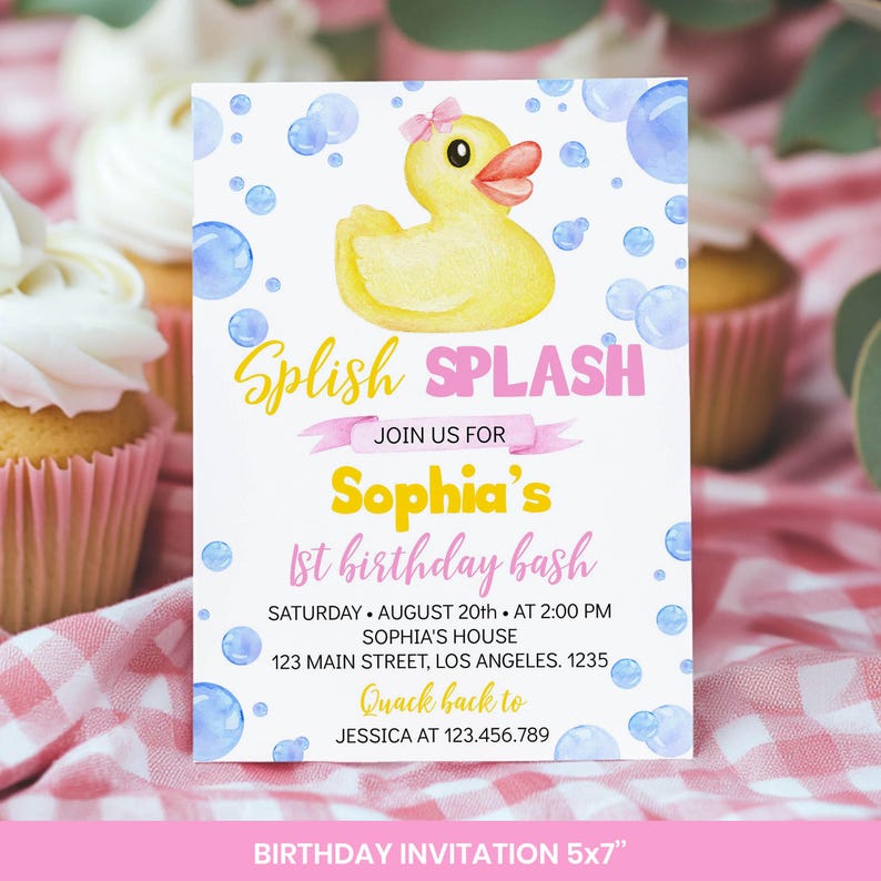 May include: A rectangular birthday invitation card featuring a yellow rubber duck with a pink bow, blue bubbles, and the text: Splish SPLASH JOIN US FOR Sophia's 1st birthday bash SATURDAY AUGUST 20th AT 2:00 PM SOPHIA'S HOUSE 123 MAIN STREET, LOS ANGELES. 1235 Quack back to JESSICA AT 123.456.789.