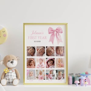 May include: A gold-framed poster titled Juliana's FIRST YEAR with the date 25.11.202X and a large pink bow graphic. The poster features a grid of twelve individual photographs of a baby, each labeled with a month, documenting growth over time.