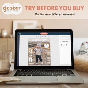 May include: A laptop screen displaying a digital milestone birthday poster template titled OLIVER IS ONE. The design features a central photograph of a toddler, white text detailing age, weight, and interests, and a Corjl editing interface.