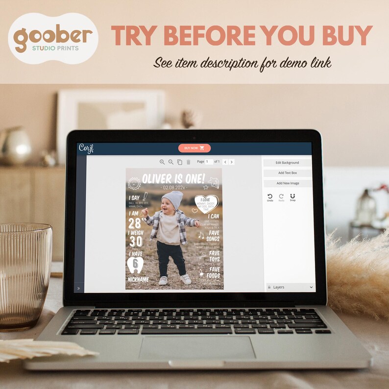 May include: A laptop screen displaying a digital milestone birthday poster template titled OLIVER IS ONE. The design features a central photograph of a toddler, white text detailing age, weight, and interests, and a Corjl editing interface.
