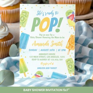 May include: A rectangular baby shower invitation card featuring colorful popsicle illustrations and confetti dots. The text reads: She's ready to POP! Pop on over for a Baby Shower Honoring the Mom-to-be, Amanda Smith, Sunday, August 20th, at 2pm.
