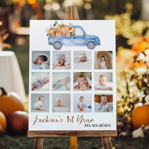 Puede incluir: Un letrero blanco sobre un caballete de madera presenta una ilustración de un camión azul que transporta calabazas y follaje de otoño. Debajo, doce fotos de bebé están dispuestas en una cuadrícula. El texto "Jackson's 1st Year" y la fecha "10.10.202X" se muestran.