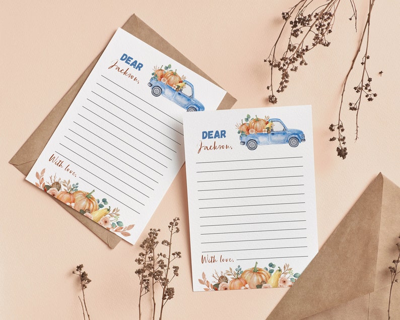 May include: Two white stationery sheets with horizontal lines, featuring a watercolor illustration of a blue pickup truck carrying pumpkins and autumn foliage. The text reads Dear Jackson and With love, accented by pumpkins and leaves at the bottom.