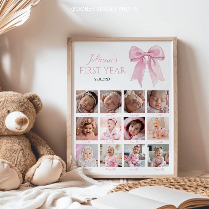 May include: A rectangular framed print titled Juliana's FIRST YEAR with the date 25.11.202X and a large pink bow illustration. The print features a grid of twelve individual photographs documenting a baby's growth from 1 to 12 months.
