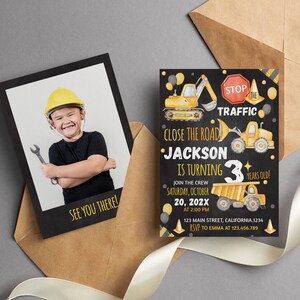 May include: A construction-themed birthday invitation set featuring a photo card of a child in a yellow hard hat holding a wrench and a black card with yellow construction vehicles, traffic signs, and text reading Jackson is turning 3 years old.