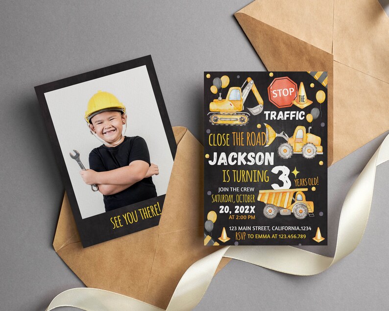 May include: A construction-themed birthday invitation set featuring a photo card of a child in a yellow hard hat holding a wrench and a black card with yellow construction vehicles, traffic signs, and text reading Jackson is turning 3 years old.