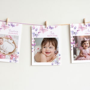 May include: Three photo cards with a butterfly theme. The first card shows a newborn baby in a basket with pink flowers. The second card shows a baby girl smiling at the camera. The third card shows a baby girl in a pink dress. The cards are decorated with purple and pink watercolor butterflies.