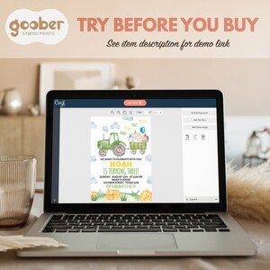 May include: A laptop screen displaying a digital birthday invitation template featuring a green tractor pulling a wagon with farm animals, blue clouds, and yellow hay bales. The text reads: We want to celebrate with you! Noah is turning three!