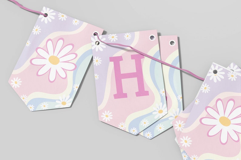 May include: A decorative bunting banner featuring a series of pennants strung on a pink cord. Each pennant displays a pastel wavy pattern in light blue, pink, and lavender, accented with white daisy flowers and a large pink letter H on one piece.