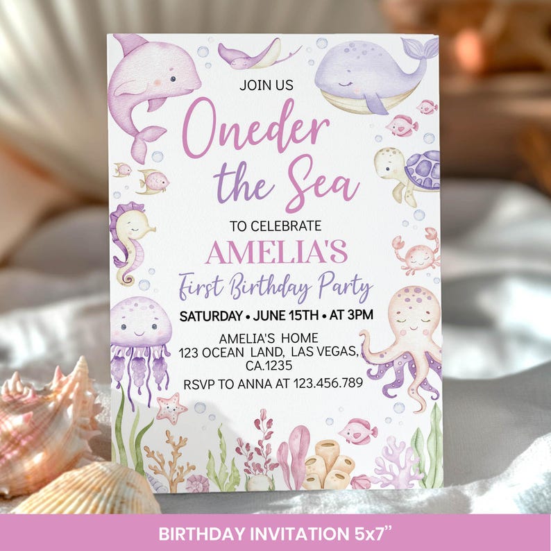 May include: A rectangular birthday invitation card featuring watercolor illustrations of a dolphin, whale, sea turtle, seahorse, octopus, and coral. The text reads: JOIN US Oneder the Sea TO CELEBRATE AMELIA'S First Birthday Party SATURDAY JUNE 15TH AT 3PM.