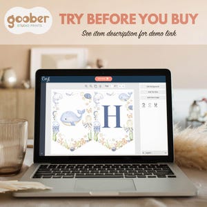 May include: A laptop displays a banner design with watercolor illustrations of whales, jellyfish, and other sea creatures. The letter "H" is prominently featured. Text at the top reads "TRY BEFORE YOU BUY" and "See item description for demo link."