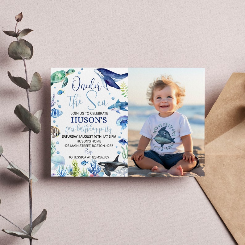 May include: A blue and white invitation card with a watercolor illustration of sea creatures and the text "Oneder the Sea" and "Huson's first birthday party". The invitation includes the date, time, and location of the party. A photo of a baby boy is in the bottom right corner of the card.