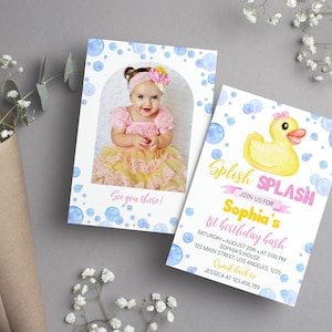 May include: Two rectangular birthday invitation cards featuring a watercolor blue bubble pattern. One card displays a photo of a child in a pink and yellow dress, the other features a yellow rubber duck and text: Splish Splash Join us for Sophia's 1st birthday bash, Saturday August 20th at 2:00 PM, Sophia's house, 123 Main Street, Los Angeles, 1235, Quack back to Jessica at 123.456.789.