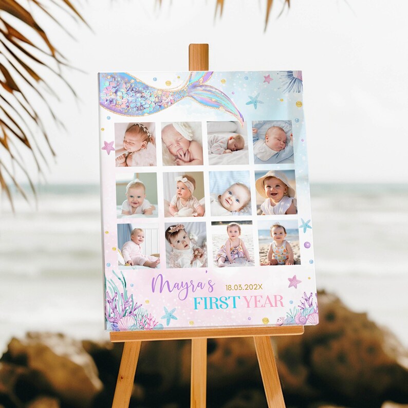 May include: A pink and blue mermaid-themed photo collage canvas with a mermaid tail design at the top. The canvas features 12 photos of a baby girl in a grid layout. The text "Mayra's First Year 18.03.202X" is printed at the bottom.
