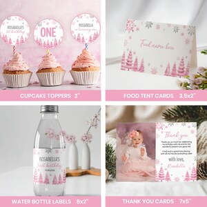 May include: A collection of birthday party supplies featuring pink pine trees and silver snowflakes. Includes 5.08cm cupcake toppers, 8.89x5.08cm food tent cards, 20.32x5.08cm water bottle labels, and 17.78x12.7cm thank you cards with custom text.