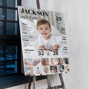 May include: A white and gray poster with a black border and text that reads "Jackson, my first year." The poster features a photo of a baby boy with a tooth, and includes details about the baby's age, height, weight, favorite foods, songs, and books. The poster also includes a grid of photos of the baby at different ages.
