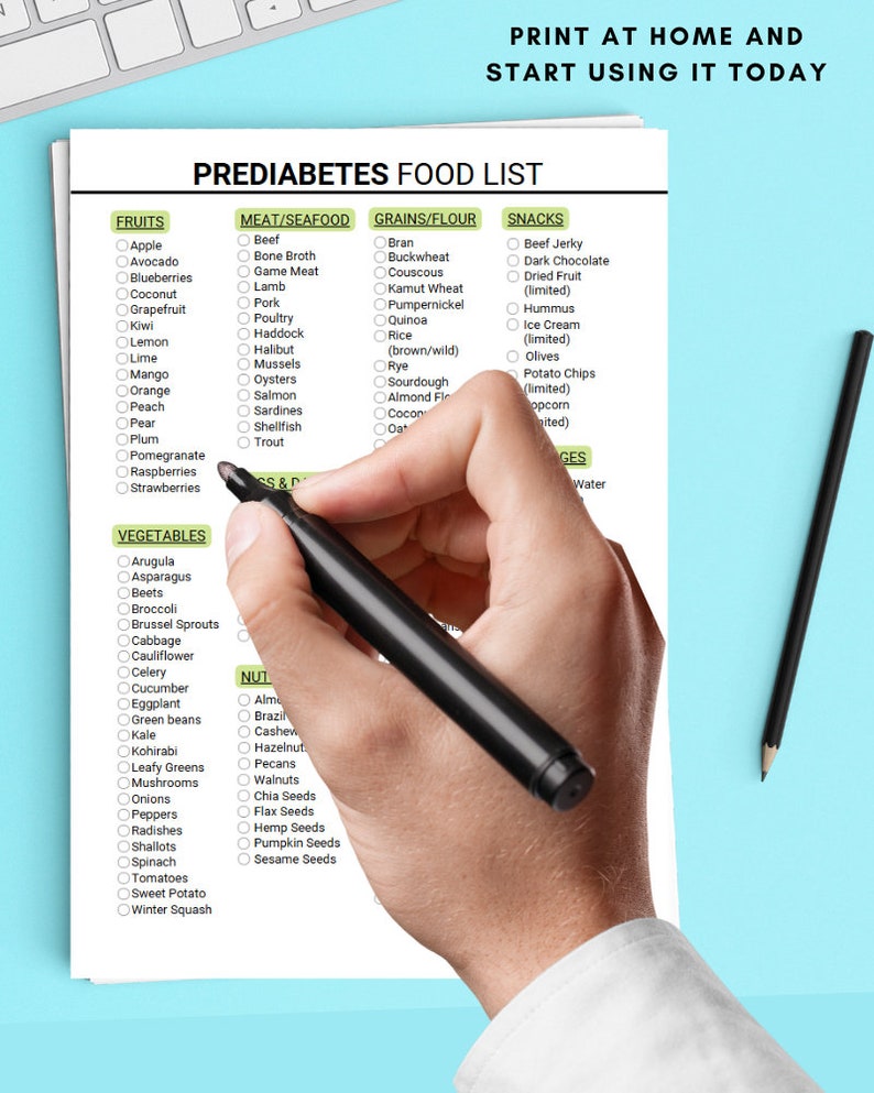 May include: A printable prediabetes food list with checkboxes for fruits, vegetables, meat and seafood, grains and flour, and snacks. The list is organized into categories with a hand holding a black marker over the list.