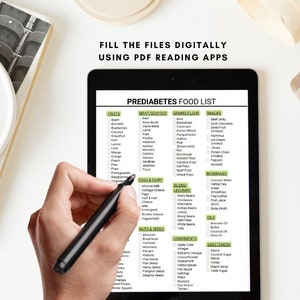 May include: A digital tablet displaying a pre-diabetes food list with checkboxes for various food categories, including fruits, vegetables, grains, meat, seafood, beans, legumes, nuts, seeds, eggs, dairy, condiments, oils, and sweeteners. The tablet is being used with a stylus.
