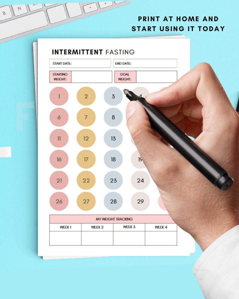 May include: Printable intermittent fasting tracker with a calendar grid of 29 days, labeled with numbers 1 through 29. The calendar is divided into four weeks. The tracker also includes sections for starting and ending dates, starting and goal weights. The tracker is printed on white paper with pink and blue accents.