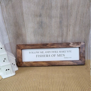 Follow me and I will make you fishers of men. Matthew 4:19 Engraved with the Glowforge then beautifully framed.  Add beauty to any home.