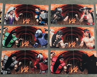 May include: A set of 12 trading cards featuring characters from the Mortal Kombat video game series. Each card features two characters facing off against each other. The cards are printed on a thick, glossy card stock and have a vibrant color scheme.