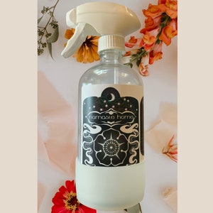 Reusable Glass Cleaning Spray Bottle by Namaste Home, features a 100% Recycled Plastic Trigger Sprayer, + Silicone Base to Prevent Breakage