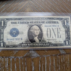 1928a one dollar funny back silver certificate,  antique dollar bill, coin collecting  nice block dollar