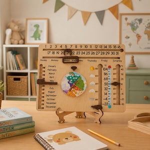 May include: A wooden perpetual calendar board featuring a sliding date marker, month list, weather icons, and a dual-scale thermometer showing Fahrenheit and Celsius. The board includes a central circular seasonal wheel and movable wooden sliders.