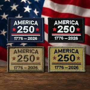 May include: Four rectangular patches with the text "AMERICA 250" and the years "1776-2026". The patches are in navy blue, black, and two shades of tan. The background is an American flag.