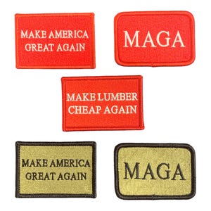 May include: Four embroidered patches with red and gold fabric. Two patches say "Make America Great Again" in white text. One patch says "Maga" in white text. One patch says "Make Lumber Cheap Again" in white text.