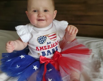 All American Babe: Baby Girl Flutter Sleeve Glitter 4th of July Bodysuit with American Flag Tutu