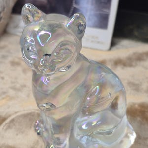 Fenton Iridescent Classic sitting Cat. The Iridescent Kitten Vintage Figurine radiates colors when the sunshines through it!