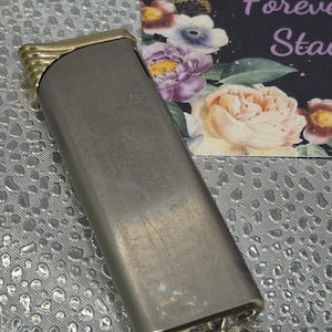 Corbeli Vintage slim brass lighter, sleek and Easy to use! Add to your collection 1980s