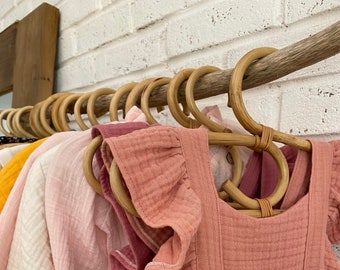 Rattan children's sun hanger. Rattan children's clothes hanger. Rattan hanger for a children's room in boho