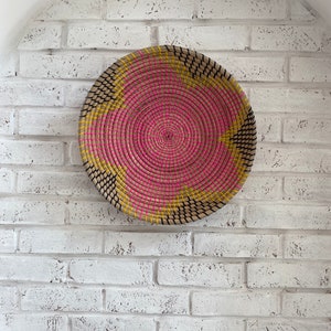 Pink wall hanging basket. Pink flower wall decor