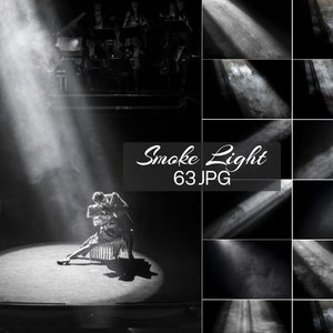 May include: A black and white photo of a couple dancing on a stage with a spotlight shining down on them. The background is dark and there is smoke in the air. The text "Smoke Light 63 JPG" is written in the center of the image.