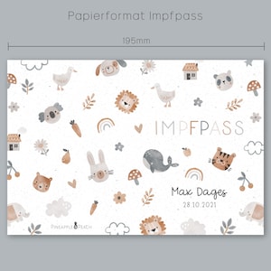 May include: A white card with a light brown and gray animal pattern. The card says "Impfpass" and "Max Dages 28.10.2021". The card is 19.5 cm by 13.2 cm.