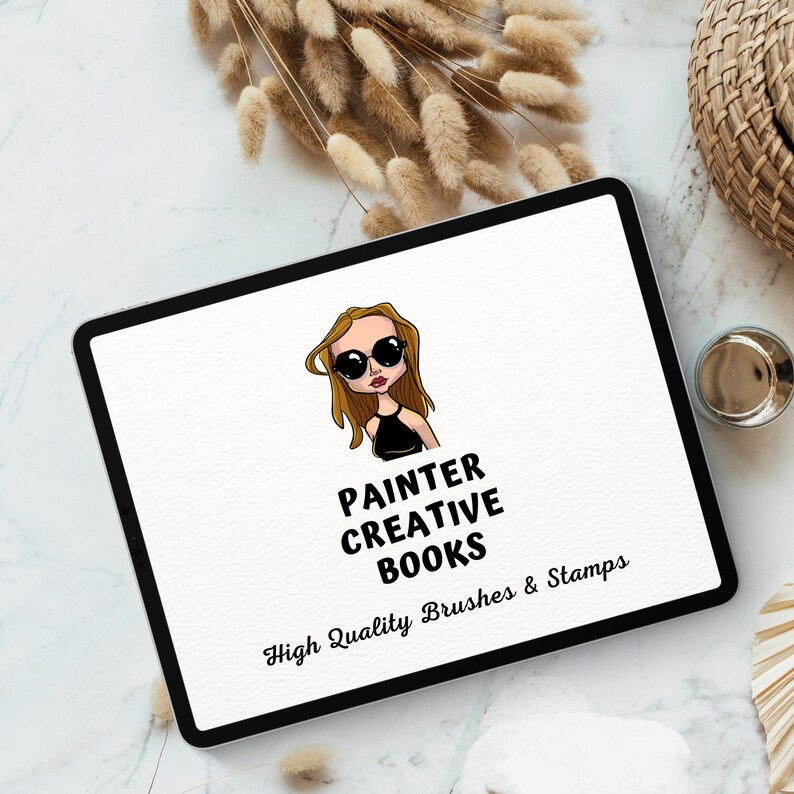 May include: A digital illustration of a woman wearing sunglasses and a black top. The text "PAINTER CREATIVE BOOKS High Quality Brushes & Stamps" is below the illustration.