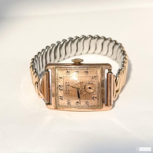 Montre tank gris métallisé unisexe à remontage manuel