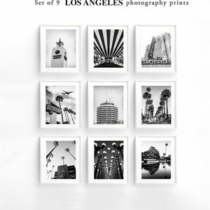 May include: Set of nine black and white photography prints featuring iconic Los Angeles landmarks, including the Farmers Market, the Hollywood sign, and the Capitol Records Building.