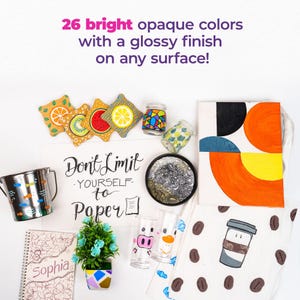 May include: An assortment of colorful art supplies and decorative items, including coasters with fruit designs, a small potted plant, and a canvas with geometric shapes. The text reads "26 bright opaque colors with a glossy finish on any surface!" and "Don't Limit Yourself to Paper."