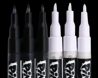 Rotuladores de pintura acrílica en blanco y negro – Punta extrafina para pintura sobre piedra y caligrafía / Paquete de 6, 0,7 mm